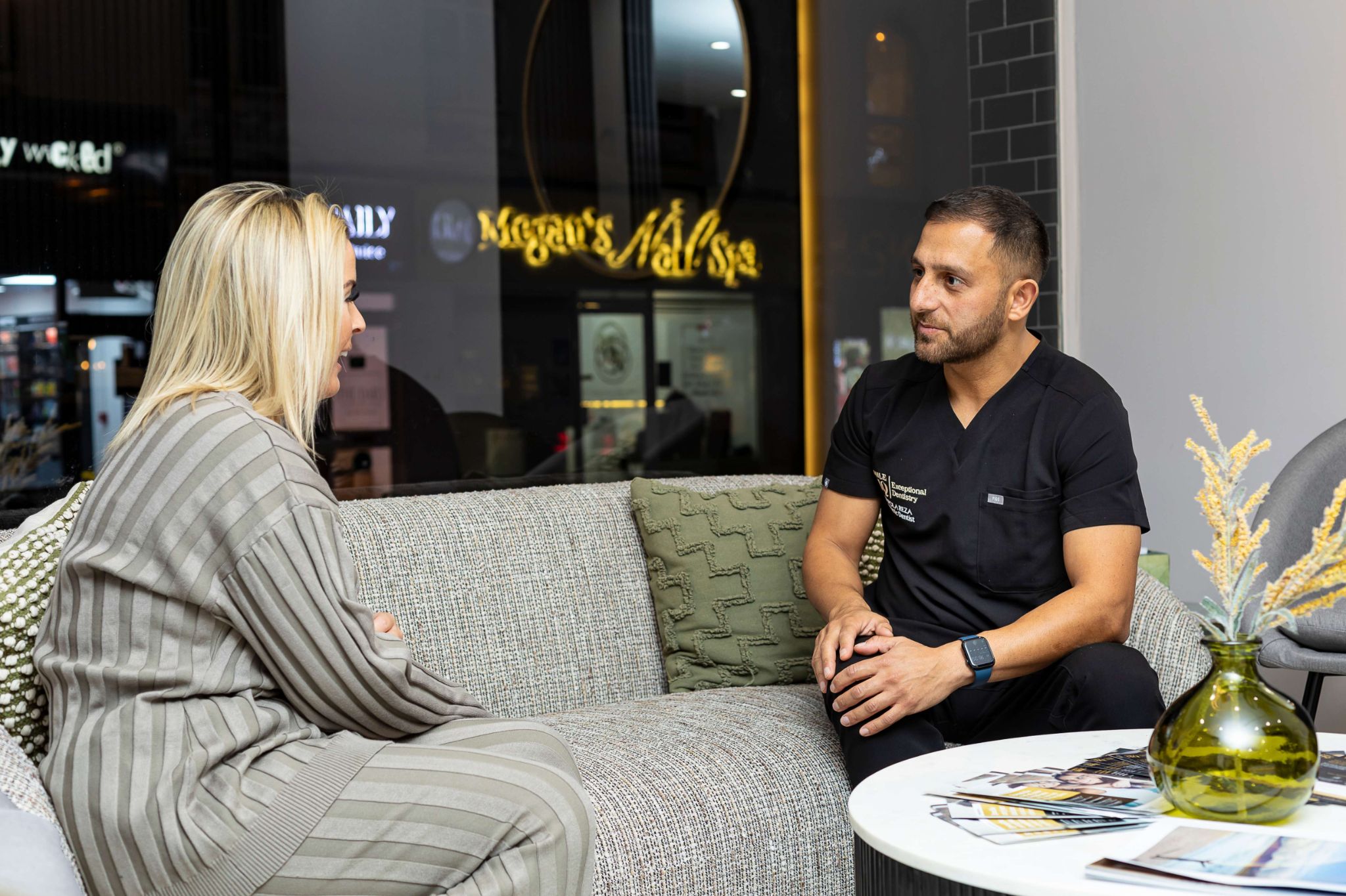 Dr Pola Reza consulting with patient about teeth whitening treatment at SmileHQ Essex