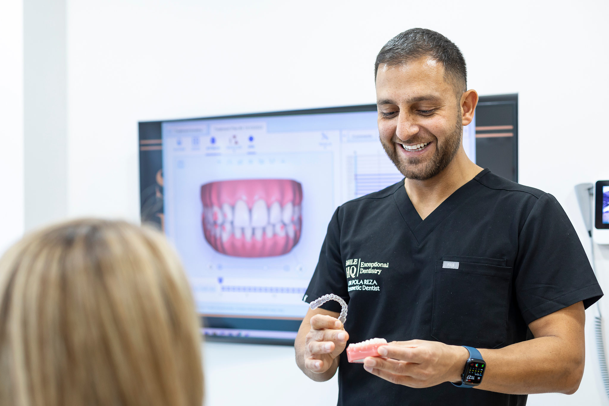 Invisalign consultation showing digital smile simulation and treatment planning at SmileHQ Essex