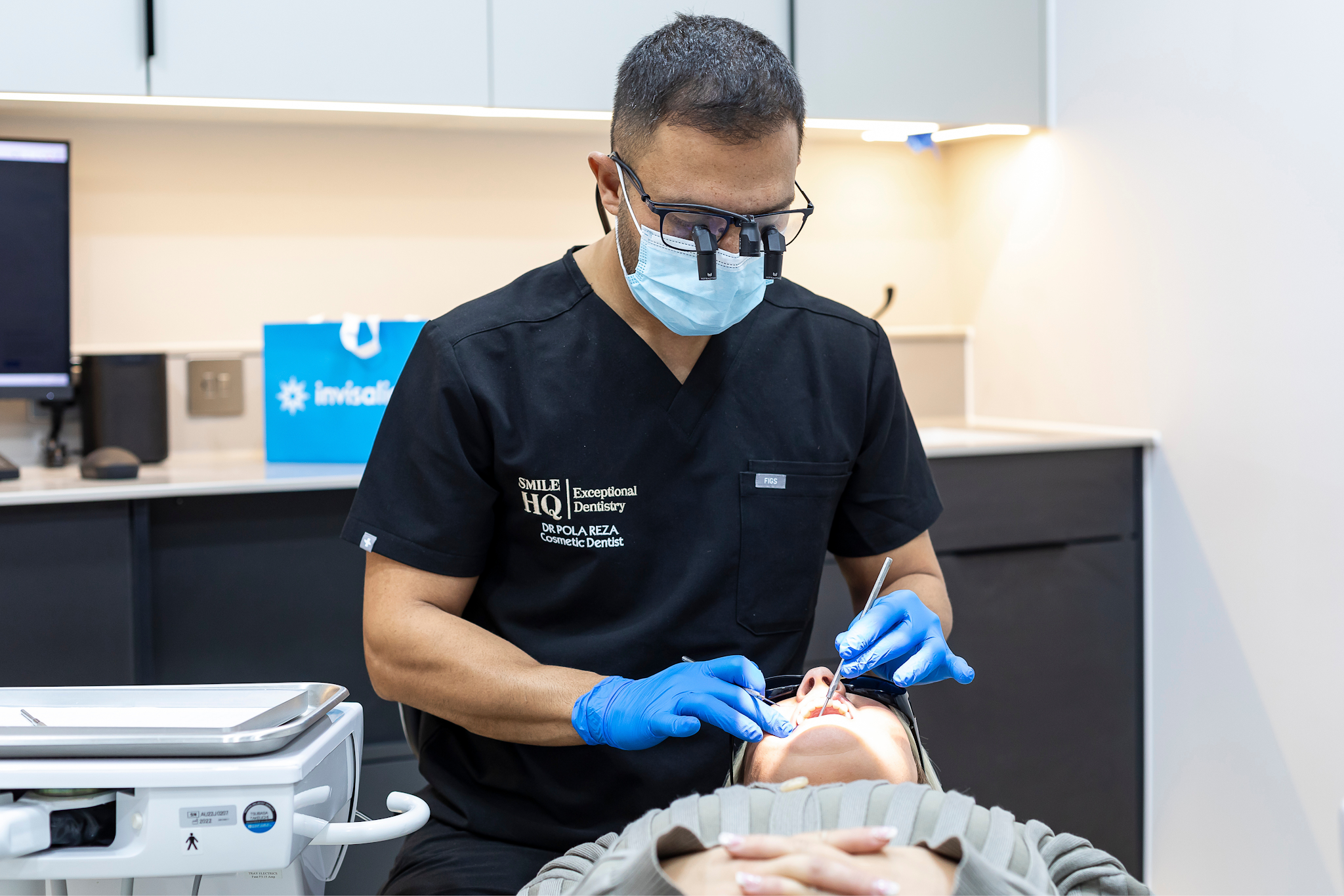 Dr Pola Reza providing Invisalign treatment and smile assessment at SmileHQ in Brentwood